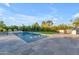 Inviting pool area with travertine decking and lush landscaping, perfect for relaxation and outdoor entertaining at 12034 N 61St St, Scottsdale, AZ 85254