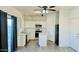 Well-equipped kitchen with white cabinetry, island, and stainless steel appliances at 12208 W Pima St, Avondale, AZ 85323