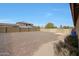 Large backyard with ample space and potential for customization, offering endless possibilities for outdoor living at 14507 W Christy Dr, Surprise, AZ 85379