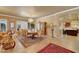 Formal dining room with chandelier lighting, a large table, and access to the kitchen at 14507 W Christy Dr, Surprise, AZ 85379
