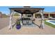 Elegant gazebo with cozy seating and decorative accents, creating a serene outdoor living space at 14507 W Christy Dr, Surprise, AZ 85379