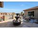 Private patio with outdoor seating and a beautiful fountain at 14507 W Christy Dr, Surprise, AZ 85379