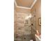 Shower featuring designer tile and black fixtures at 14507 W Christy Dr, Surprise, AZ 85379