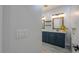 View into the bathroom, showcasing vanity with double sinks and custom mirrors at 1629 E Prickly Pear Pl, Casa Grande, AZ 85122