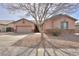 Lovely single-story home featuring a well-kept yard and a convenient two-car garage at 1629 E Prickly Pear Pl, Casa Grande, AZ 85122