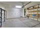 Spacious garage with shelving and a garage door at 1629 E Prickly Pear Pl, Casa Grande, AZ 85122