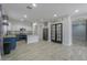 Modern kitchen featuring granite countertops, stainless steel appliances, and wood-look floors at 1629 E Prickly Pear Pl, Casa Grande, AZ 85122