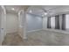 Spacious living room with recessed lighting, neutral walls, wood-look flooring, and large windows at 1629 E Prickly Pear Pl, Casa Grande, AZ 85122