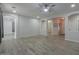 Spacious living room with wood-look floors, recessed lighting and an airy feel at 1629 E Prickly Pear Pl, Casa Grande, AZ 85122