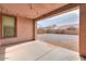 Outdoor covered patio space that looks out onto a large backyard at 1629 E Prickly Pear Pl, Casa Grande, AZ 85122
