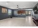 Spacious living room with neutral tile flooring, ample natural light, and modern finishes at 16430 W Alameda Rd, Surprise, AZ 85387