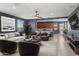 Beautiful living room with plush seating, modern decor, and an open concept design at 16430 W Alameda Rd, Surprise, AZ 85387