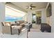 Comfortable covered patio with lounge seating is perfect for outdoor entertaining at 1700 W Paisley Dr, San Tan Valley, AZ 85144