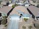 Aerial view of home showcasing the front elevation, driveway, and landscaping at 1700 W Paisley Dr, San Tan Valley, AZ 85144