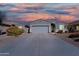 Charming single-Gathering home with a two-car garage, desert landscaping, and a long driveway at 1700 W Paisley Dr, San Tan Valley, AZ 85144