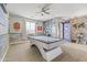 Spacious game room with sleek pool table, neutral walls, and contemporary décor at 1700 W Paisley Dr, San Tan Valley, AZ 85144
