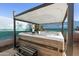 Hot tub area features a spa under a gazebo with backyard mural at 1700 W Paisley Dr, San Tan Valley, AZ 85144