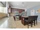A kitchen featuring granite countertops, stainless steel appliances, and dark wood cabinets at 1700 W Paisley Dr, San Tan Valley, AZ 85144