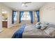 A light-filled main bedroom featuring ample natural light and neutral-toned walls at 1700 W Paisley Dr, San Tan Valley, AZ 85144