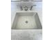 Close-up shot of a bathroom sink with a white marble countertop and modern faucet at 17168 W Middlebury St, Surprise, AZ 85388