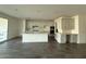 Spacious kitchen featuring white cabinets, stainless steel appliances, and a center island at 17168 W Middlebury St, Surprise, AZ 85388