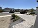 A peaceful street view showcases the neighborhood's well-maintained homes and sidewalks in a friendly setting at 17168 W Middlebury St, Surprise, AZ 85388