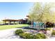 Estrella community clubhouse with desert landscaping and outdoor amenities at 18322 W Thistle Landing Dr, Goodyear, AZ 85338