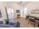 Bright office space featuring a dark desk and neutral decor, perfect for a productive work environment at 18322 W Thistle Landing Dr, Goodyear, AZ 85338