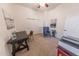 Inviting office area with a desk, chair, closet, and stylish decor at 18322 W Thistle Landing Dr, Goodyear, AZ 85338