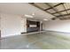 Spacious garage features finished floor, storage cabinets, and ample room for parking and projects at 18860 N 73Rd Dr, Glendale, AZ 85308