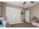 Bedroom featuring a ceiling fan and bright closet space at 20539 W Terrace Ln, Buckeye, AZ 85396