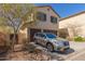 Charming two-story home with a two car garage and desert landscaping at 20539 W Terrace Ln, Buckeye, AZ 85396