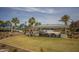 Beautiful community pool area with BBQ and seating, perfect for outdoor entertaining and relaxation at 20539 W Terrace Ln, Buckeye, AZ 85396