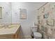 Bathroom with toilet, shower, sink, and vanity at 207 E Cedar Ave, Casa Grande, AZ 85122