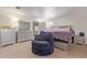 Bedroom with soft chair and silver furniture at 207 E Cedar Ave, Casa Grande, AZ 85122