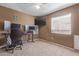 Home office area with multiple monitors at 207 E Cedar Ave, Casa Grande, AZ 85122