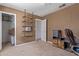 Bedroom with empty shelves and a vintage desk at 207 E Cedar Ave, Casa Grande, AZ 85122