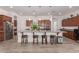 Open concept kitchen featuring an island with bar stool seating at 21165 E Thornton Rd, Queen Creek, AZ 85142