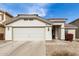Charming single-story home with a two-car garage and low maintenance desert landscaping at 23830 W Chambers St, Buckeye, AZ 85326