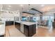 Open-concept kitchen featuring a large island, stainless steel appliances and breakfast nook at 25751 S 227Th Way, Queen Creek, AZ 85142