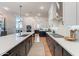 Open-concept kitchen showcasing a large island with stainless steel appliances and plenty of storage space at 25751 S 227Th Way, Queen Creek, AZ 85142
