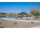 Beautiful lake view with community clubhouse and recreational area at 25751 S 227Th Way, Queen Creek, AZ 85142