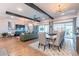 Open-concept living and dining area with modern furnishings and abundant natural light at 25751 S 227Th Way, Queen Creek, AZ 85142