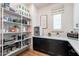 Walk-in pantry with ample shelving, storage, and built-in counter space at 25751 S 227Th Way, Queen Creek, AZ 85142