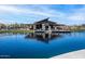 Stunning view of lakefront pavilion with outdoor seating, offering a perfect spot for community gatherings and relaxation at 25751 S 227Th Way, Queen Creek, AZ 85142