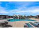 Inviting community pool area with lounge chairs, shaded seating, and well-maintained facilities, perfect for relaxation and recreation at 25751 S 227Th Way, Queen Creek, AZ 85142