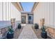 Inviting walkway with stone accents and desert landscaping leading to the front door at 25751 S 227Th Way, Queen Creek, AZ 85142