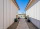 Paver walkway between the buildings with beautiful landscaping and mountain views at 25751 S 227Th Way, Queen Creek, AZ 85142