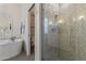 Stylish bathroom featuring a glass-enclosed shower and a soaking tub at 2906 E Nora St, Mesa, AZ 85213