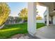 Covered patio overlooking a well-maintained backyard with lush green grass at 3019 E Redfield Rd, Phoenix, AZ 85032